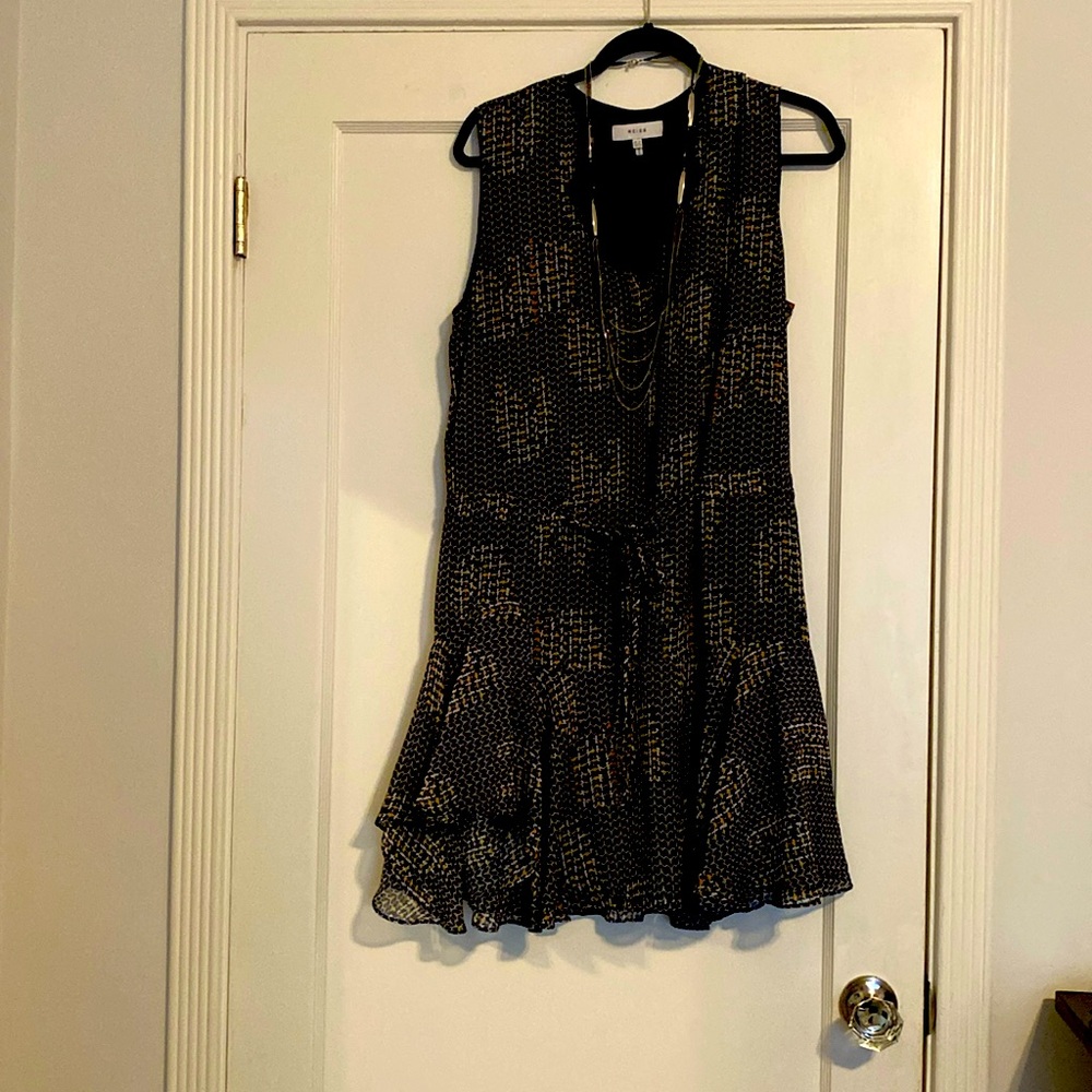 Little black dress upgraded with subtle pattern from office to happy hour